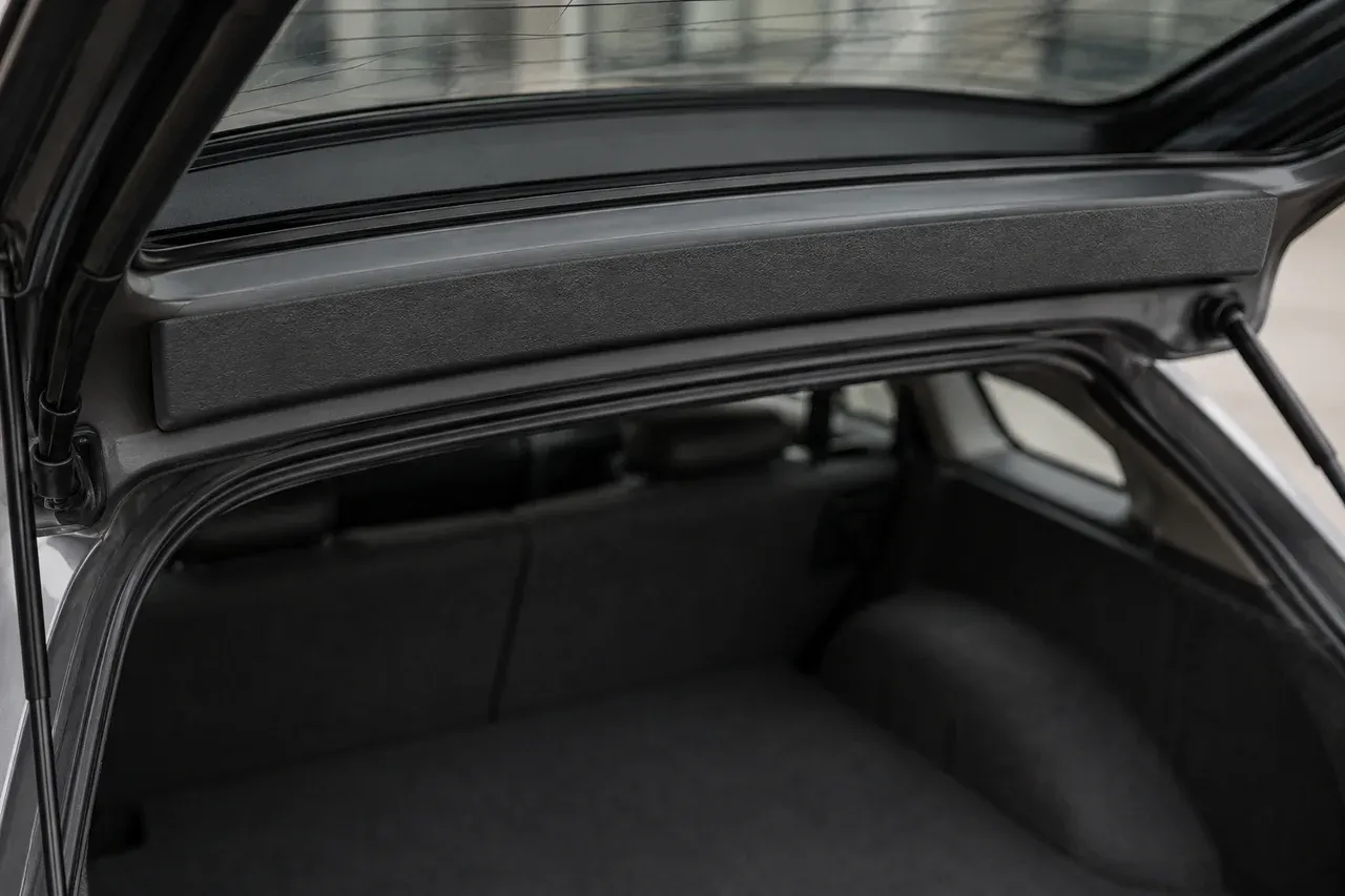The printed rear hatch interior garnish fitted in place in a car interior