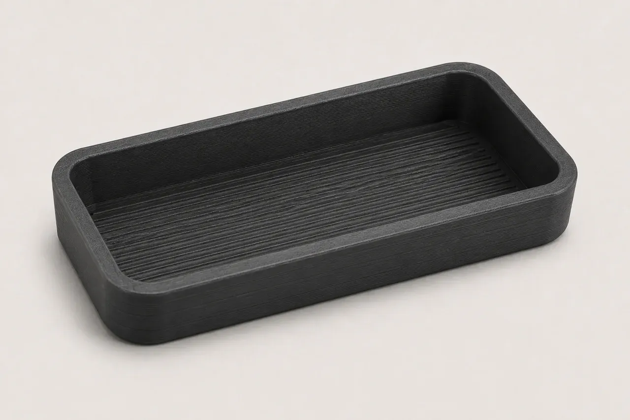 3D-printed reproduction of the center console coin tray for the 1994-2001 Acura Integra (DC2), studio view