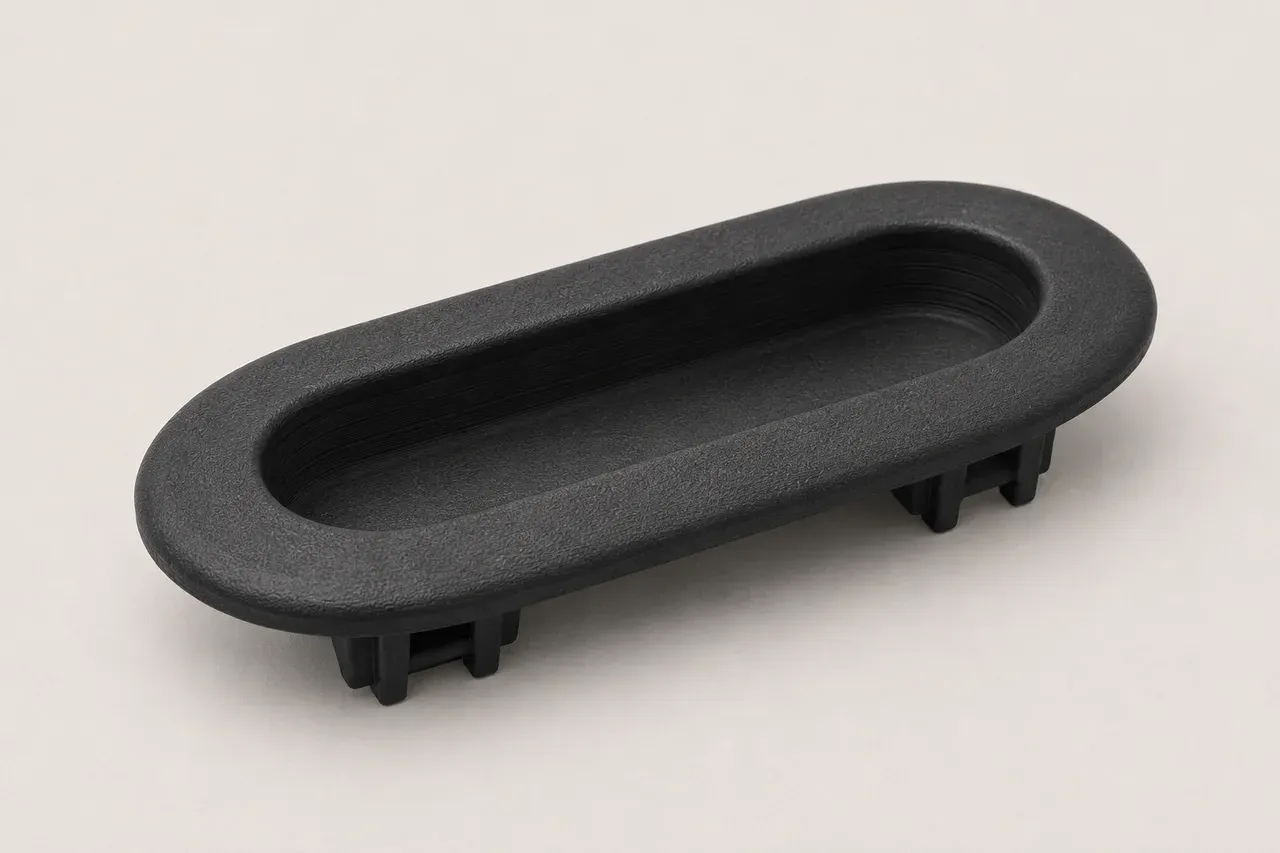 3D-printed reproduction of the door pull escutcheon, driver's side for the 1992-2000 Lexus SC300/SC400, studio view