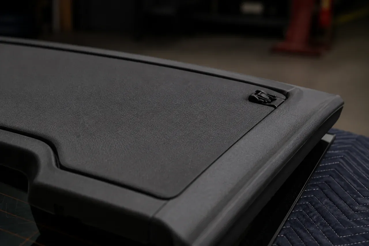 The printed t-top headliner trim set fitted in place in a car interior